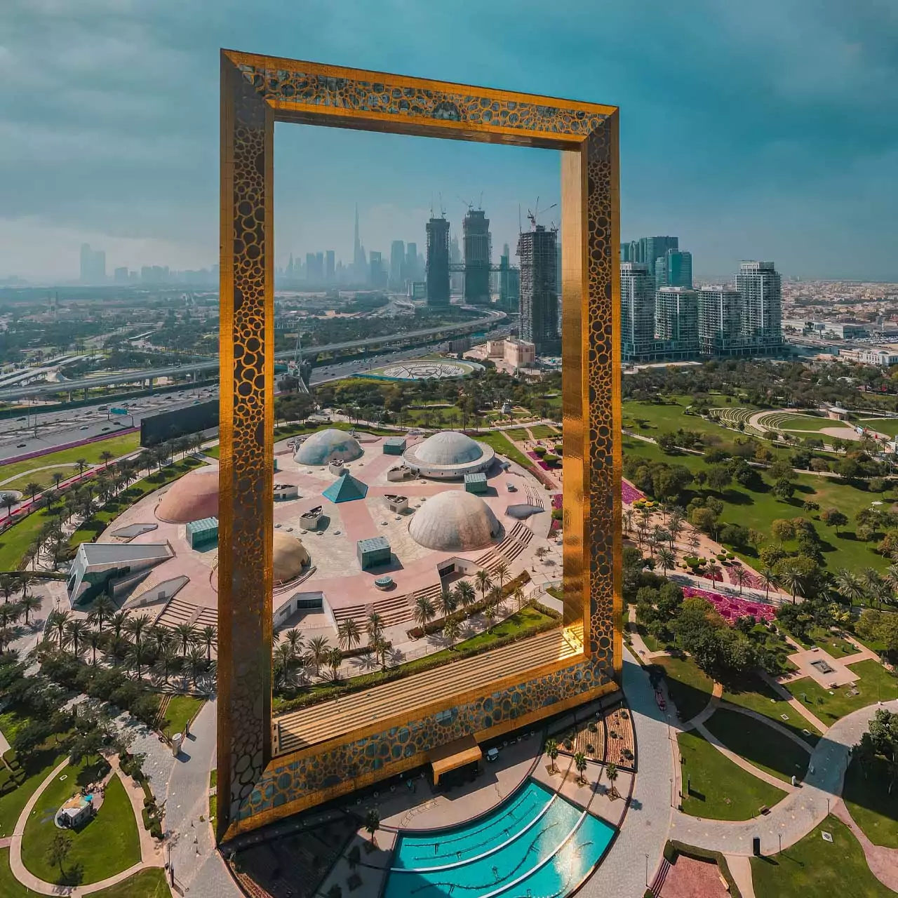 Dubai Frame towering over Zabeel Park with cityscape in the background